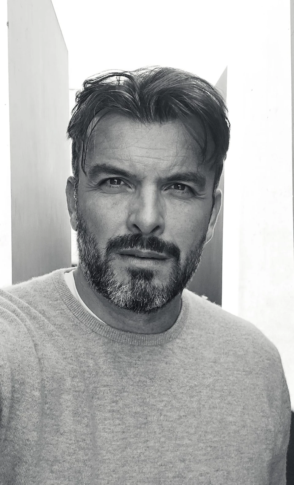 Black-and-white portrait of Sasha Rojnik