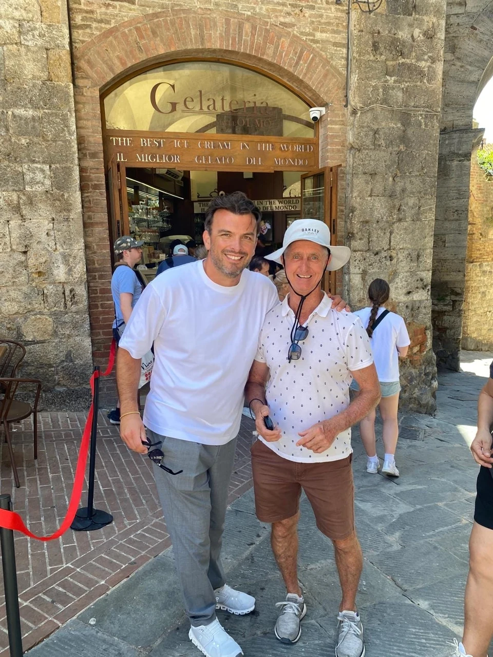 Sasha Rojnik with a guest outside a gelateria